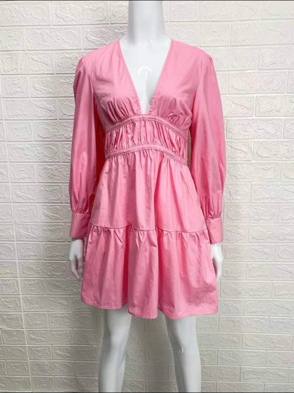 The Pippa dress in pink with long puff sleeves